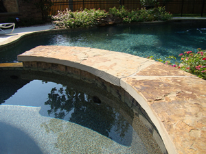 Texas-style outdoor living by the pool, by custom home builder Trent Williams, Tyler Texas